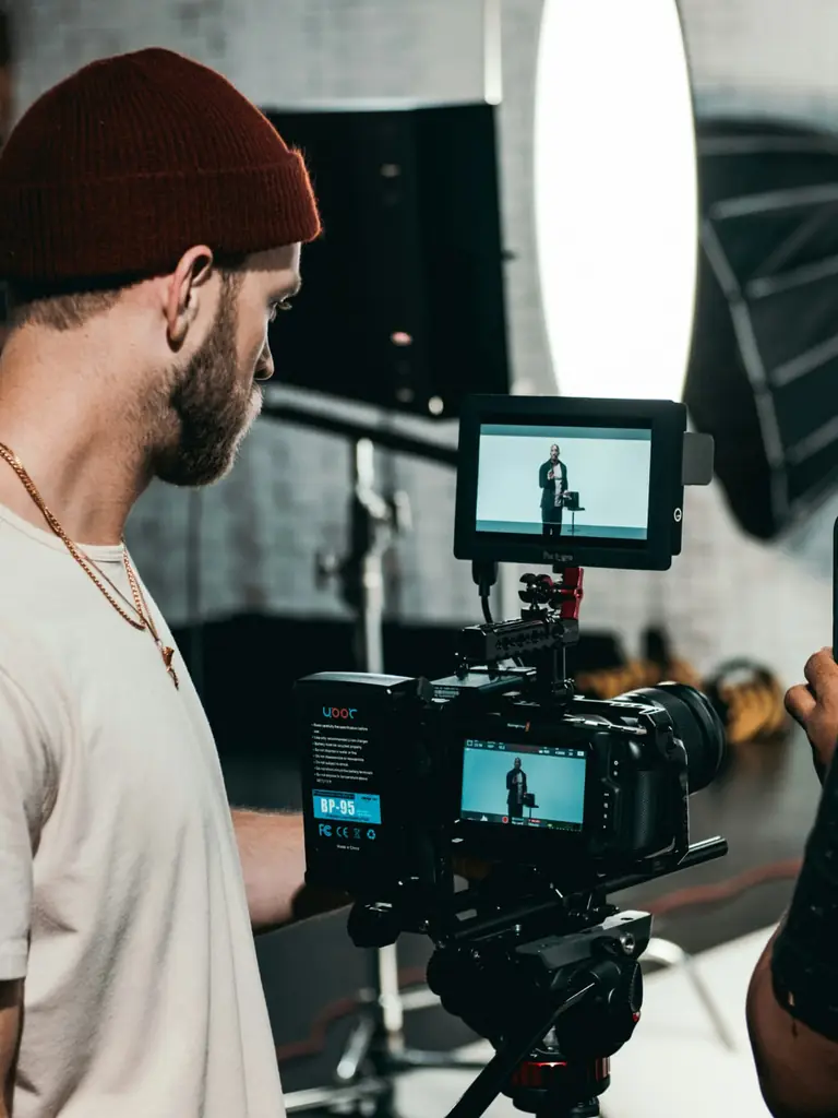 Vidéaste en tournage caméra — book image animée sur Dreebox